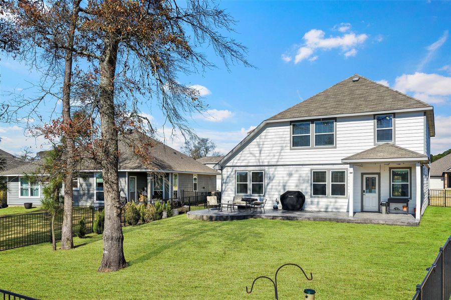 Exterior details and patio area of a home in Lakes at Crockett Martin, Conroe (Image 4). Exterior details and patio area of a home in Lakes at Crockett Martin, Conroe (Image 4).