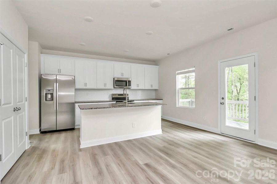Furnished interior view inside a new home in , Monroe (Image 10).