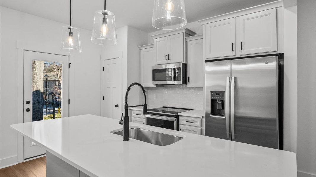 Elegant kitchen with modern finishes in this first-class townhome at Clayton Crossing near Asheville, NC