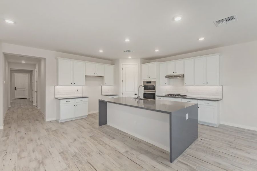Furnished interior view inside a new home in Forté at Granite Vista, Waddell (Image 6).
