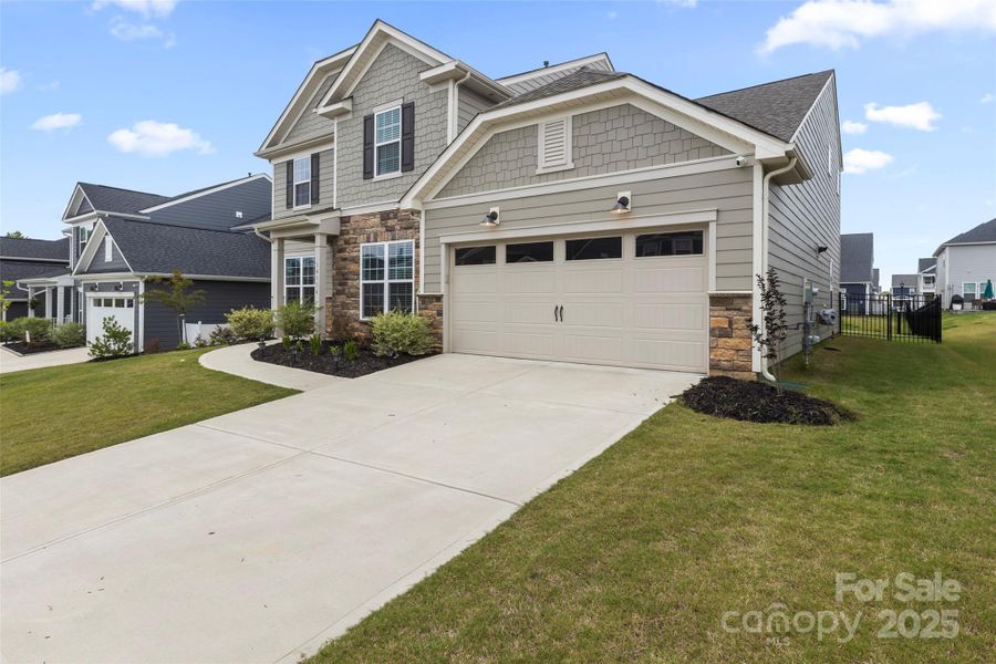 Front exterior of a new home in , Charlotte, NC, highlighting curb appeal (Image 23).