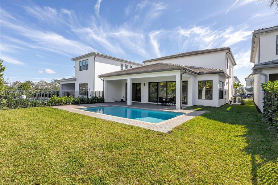 Exterior details and patio area of a home in Lotus Edge, Boca Raton (Image 31).
