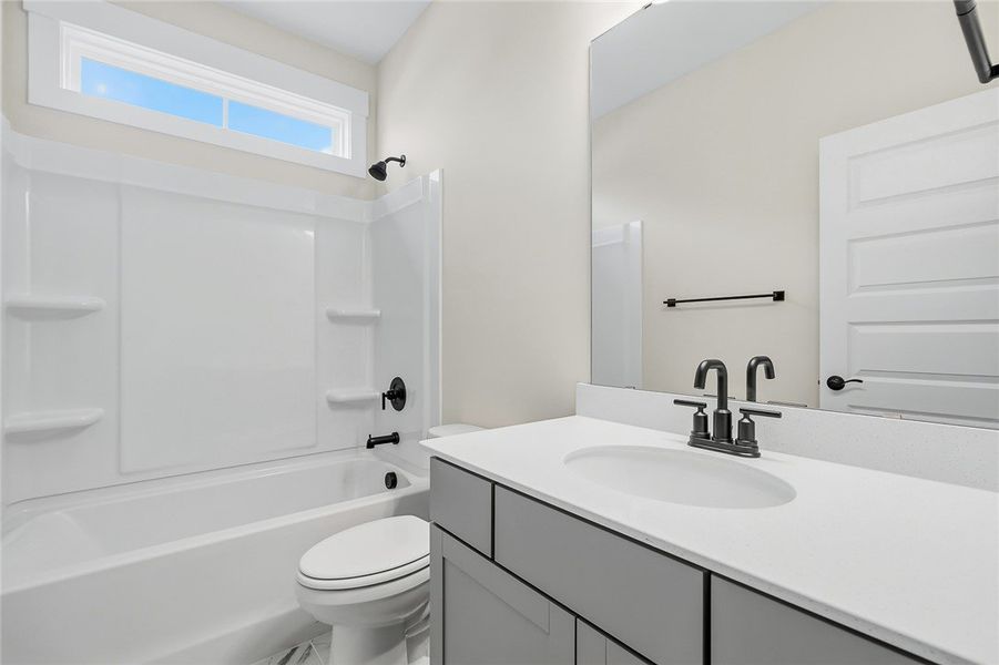 High ceilings and a transom window elevate this cl