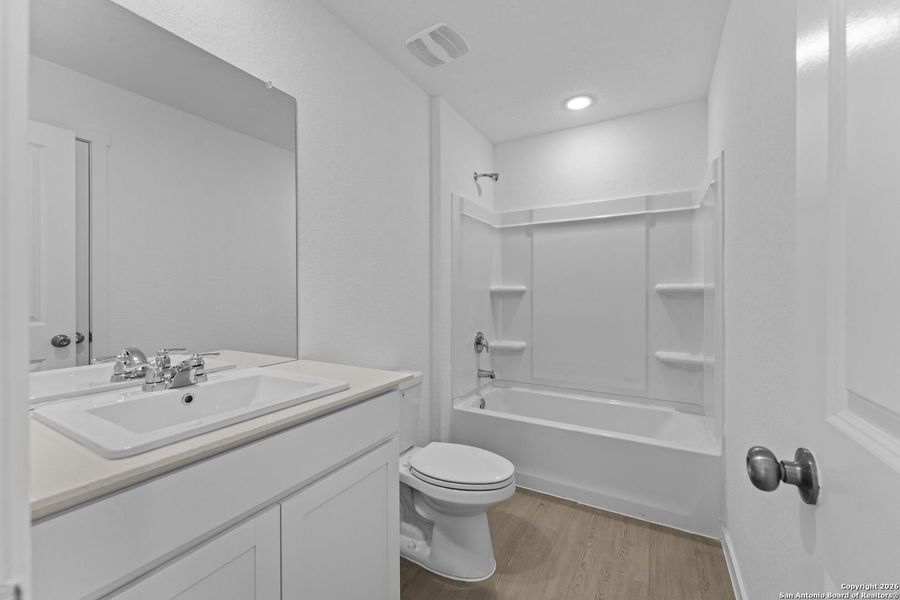 Furnished interior view inside a new home in , New Braunfels (Image 8).