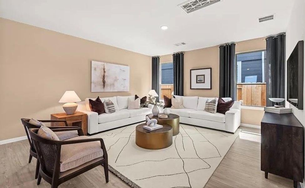 Furnished interior view inside a new home in The Pines At Seven Coves, Willis (Image 6).
