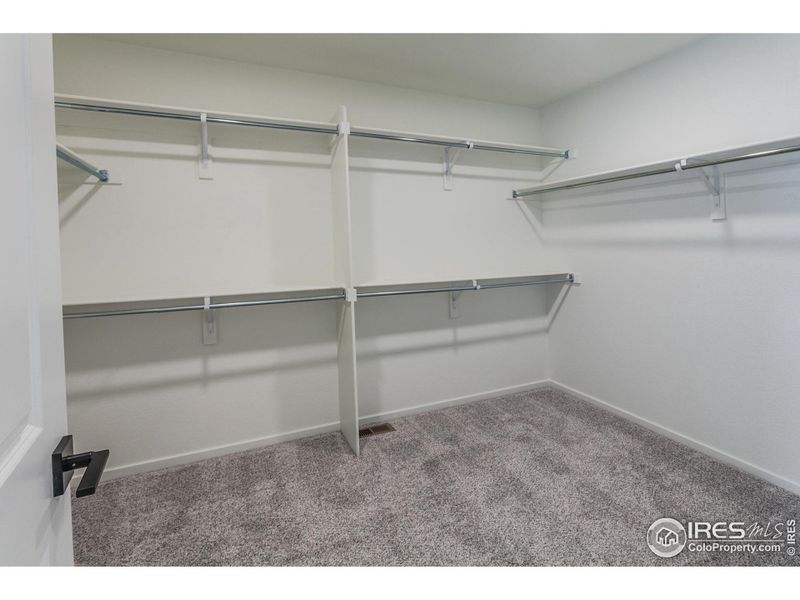 Large Primary Walk-in Closet