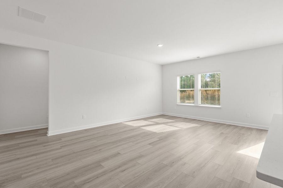 Spacious, unfurnished interior of a new home in Cypress Ridge - The Boardwalk Series, Longs (Image 15).