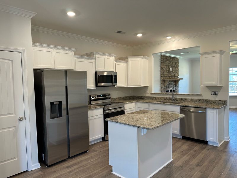 Furnished interior view inside a new home in Cumberland Estates, Fairview (Image 3).