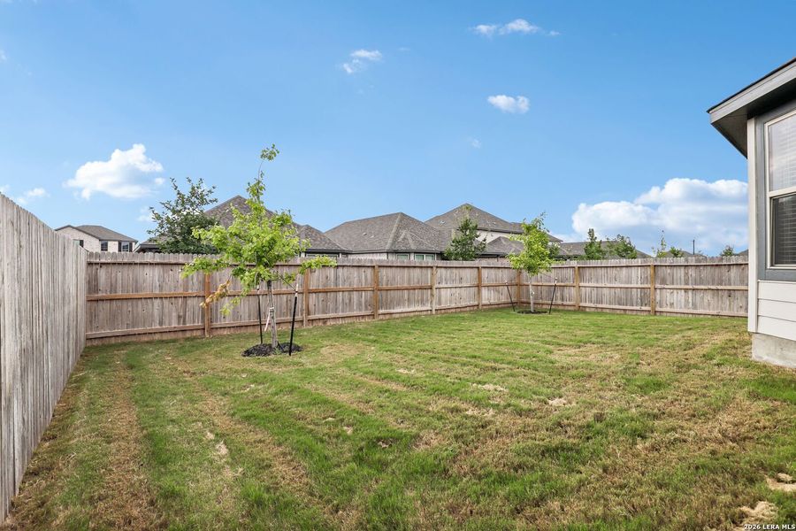 Exterior details and patio area of a home in Kallison Ranch, San Antonio (Image 26).