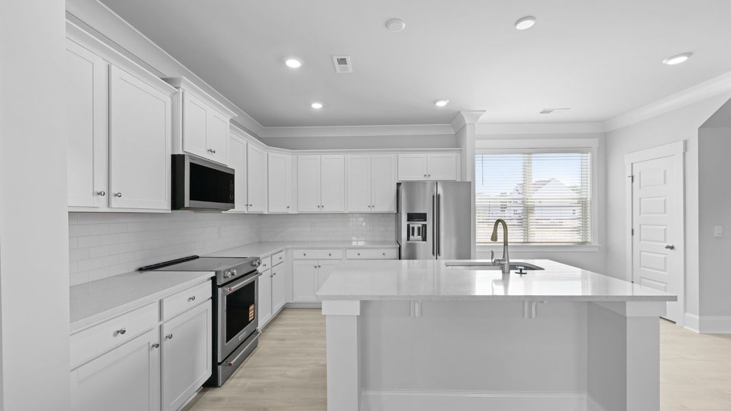 Representative furnished interior of a home built from the SPRUCEWOOD by D.R. Horton in Sheep Island, Summerville (Image 4).