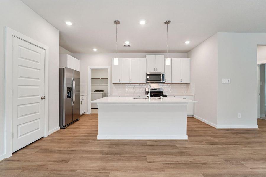 Furnished interior view inside a new home in Landing Meadows - Traditional Series, New Caney (Image 6). Furnished interior view inside a new home in Landing Meadows - Traditional Series, New Caney (Image 6).