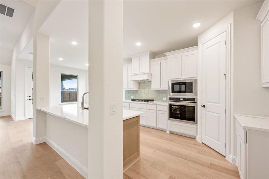 Furnished interior view inside a new home in Windsong Ranch Classic 61, Prosper (Image 11). Furnished interior view inside a new home in Windsong Ranch Classic 61, Prosper (Image 11).