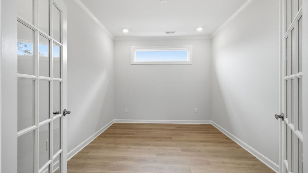 Spacious, unfurnished interior of a new home in The Courtyards at Oak Grove, Durham (Image 18).