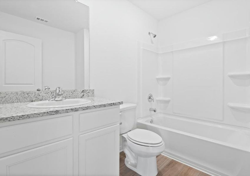 The spacious secondary bathroom.