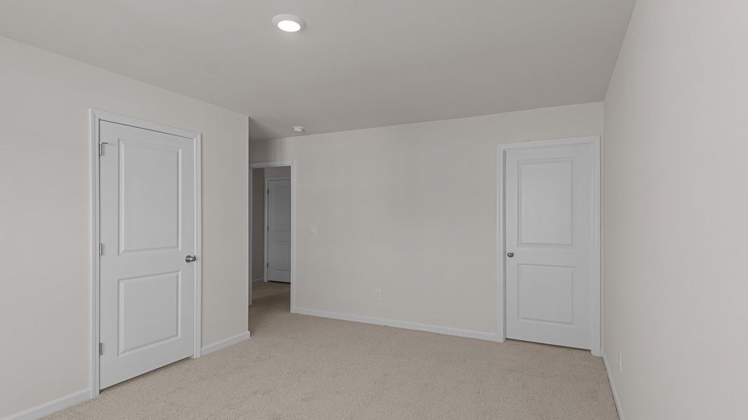 Spacious, unfurnished interior of a new home in Edinborough Townes, Gibsonville (Image 11).