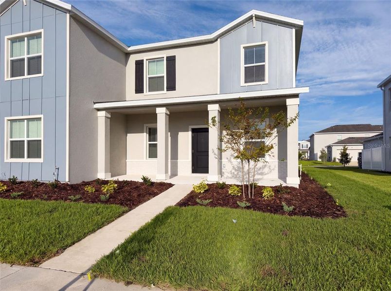 Front exterior of a new home in , Apopka, FL, highlighting curb appeal (Image 19). Front exterior of a new home in , Apopka, FL, highlighting curb appeal (Image 19).