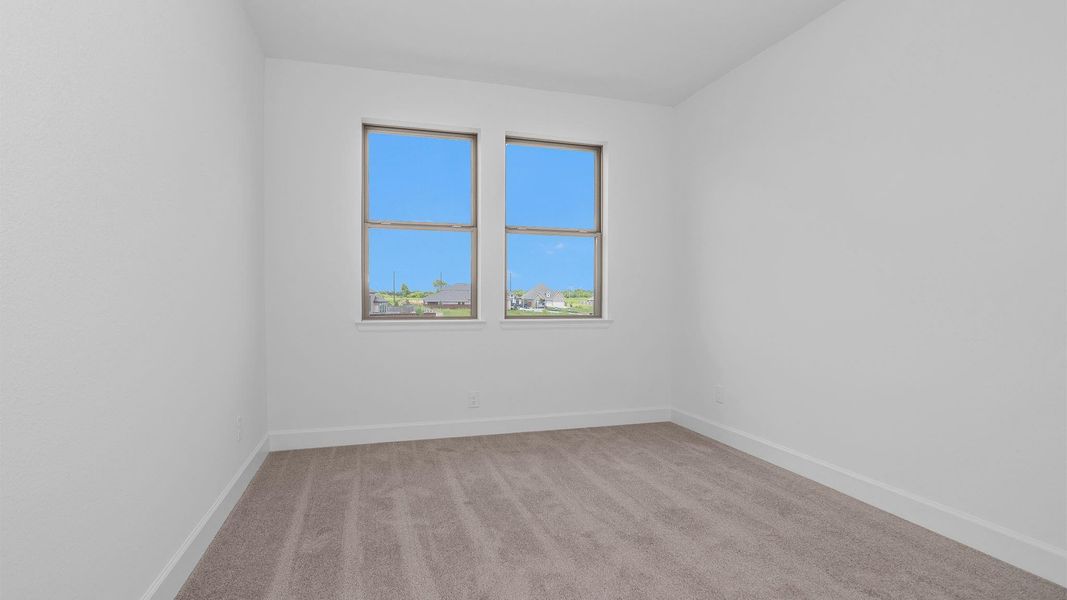 Spacious, unfurnished interior of a new home in Meridiana, Manvel (Image 11).