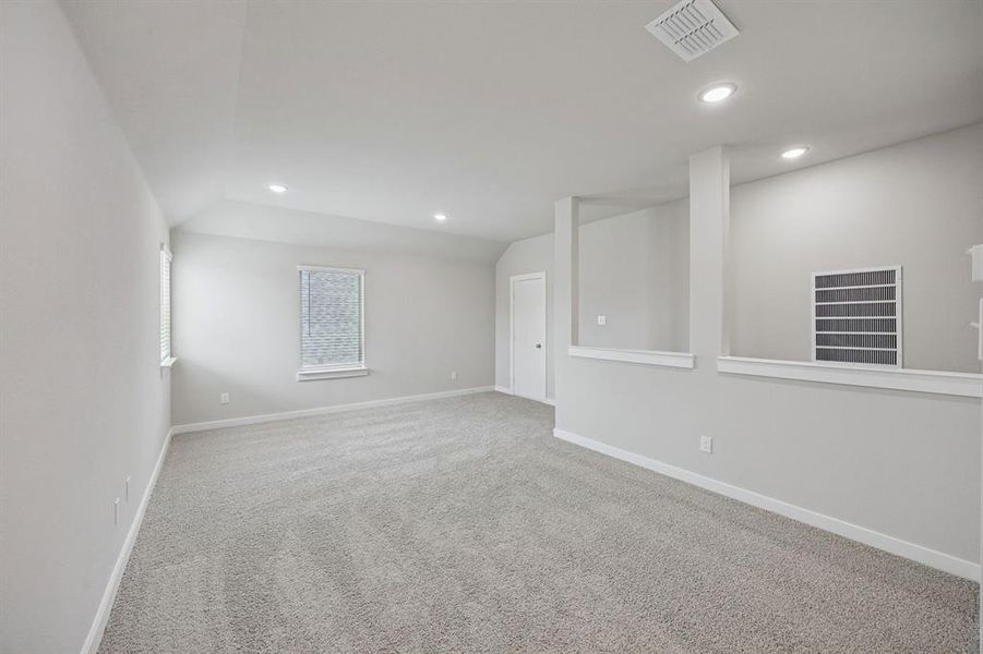 Game Room in the Stanley II home plan by Trophy Signature Homes – REPRESENTATIVE PHOTO