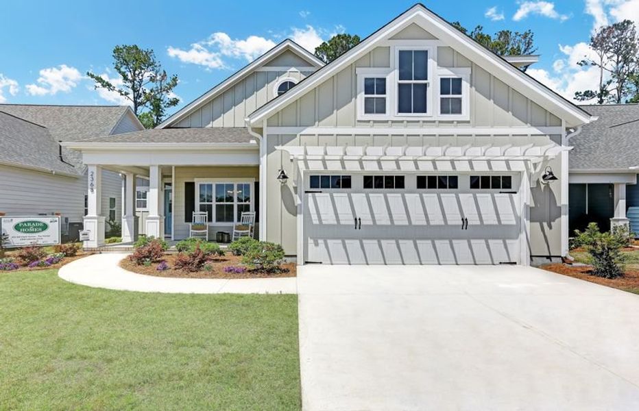 Representative exterior photo of a completed home built from the Sinclair by Bill Clark Homes in Osprey Landing, Southport, NC (Image 24).