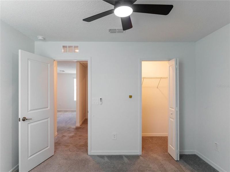 Spacious, unfurnished interior of a new home in The Isle of Avalon, Spring Hill (Image 29).