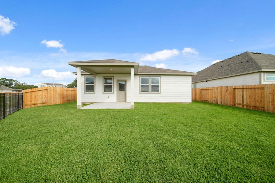 Exterior details and patio area of a home in Russell Ranch, Bay City (Image 2).