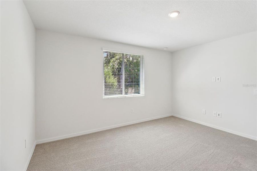 Spacious, unfurnished interior of a new home in Ridgehaven - Villas, Ormond Beach (Image 23).