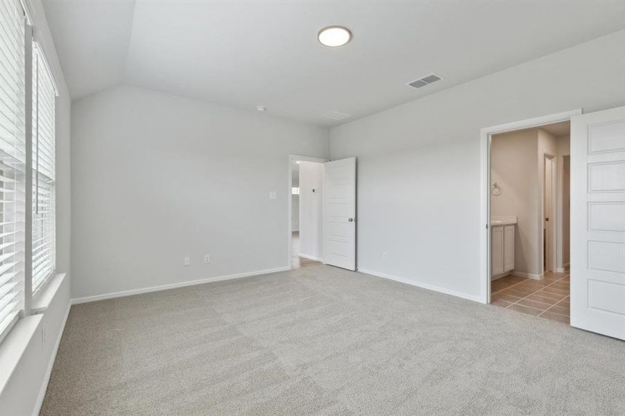 Primary Suite in the Hayden home plan by Trophy Signature Homes – REPRESENTATIVE PHOTO Primary Suite in the Hayden home plan by Trophy Signature Homes – REPRESENTATIVE PHOTO