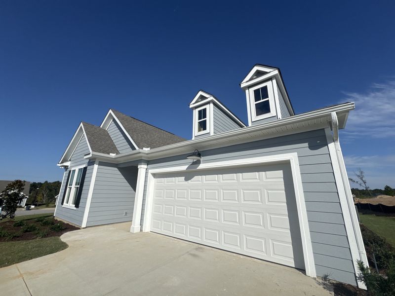 Front exterior of a new home in Sinclair at Crawford Creek, Grovetown, GA, highlighting curb appeal (Image 16).