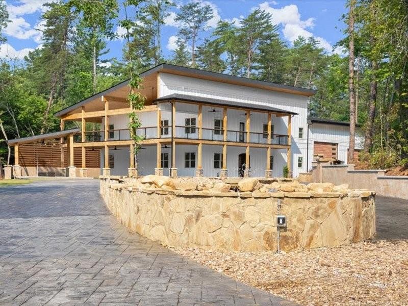 Front exterior of a new home in , Dahlonega, GA, highlighting curb appeal (Image 1).