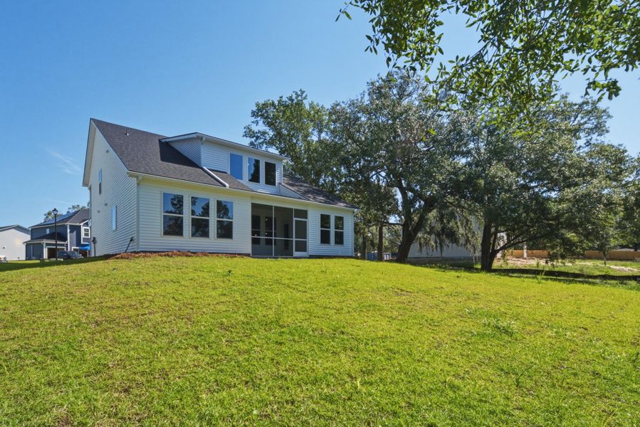 Exterior details and patio area of a home in The Oaks, Goose Creek (Image 26).