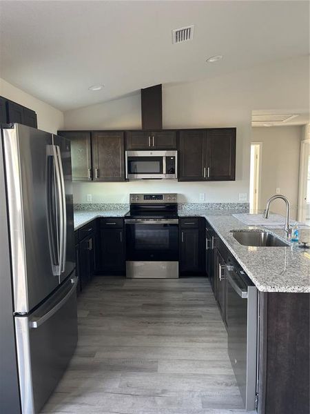 Furnished interior view inside a new home in , Inverness (Image 5).