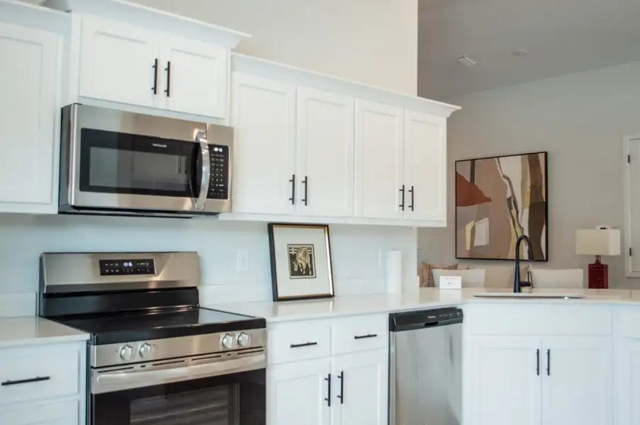 Furnished interior view inside a new home in Parkland Place, Pace (Image 9).