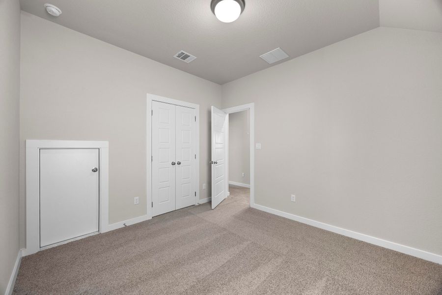 Bedroom in the Magnolia home plan by Trophy Signature Homes – REPRESENTATIVE PHOTO Bedroom in the Magnolia home plan by Trophy Signature Homes – REPRESENTATIVE PHOTO