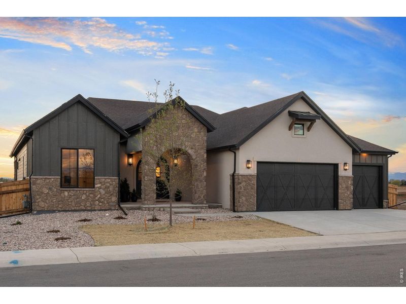 Front exterior of a new home in , Windsor, CO, highlighting curb appeal (Image 25).