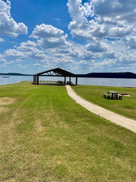Front exterior of a new home in , Graford, TX, highlighting curb appeal (Image 2). Front exterior of a new home in , Graford, TX, highlighting curb appeal (Image 2).