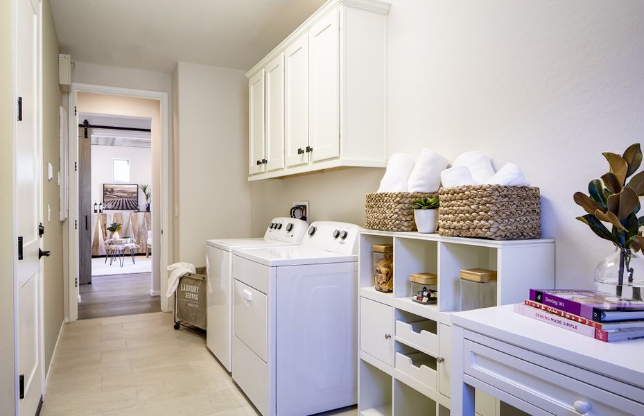 Laundry room with abundant cabinet space