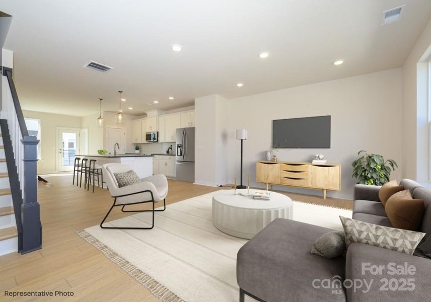 Furnished interior view inside a new home in Central Living at Craig, Charlotte (Image 5).