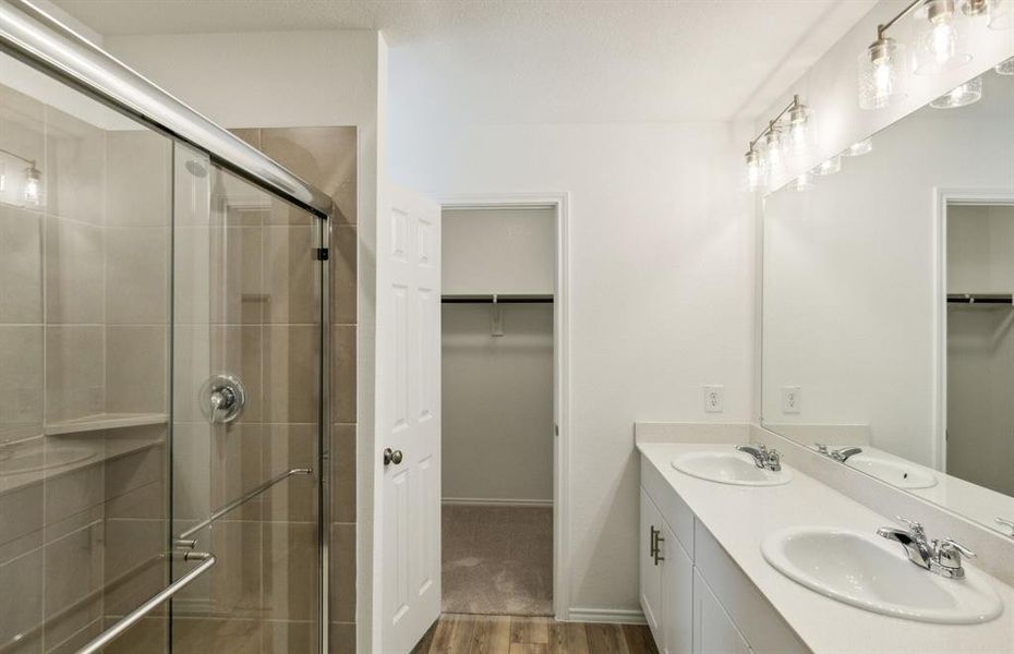 Owner's bath with oversized shower*real home pictured