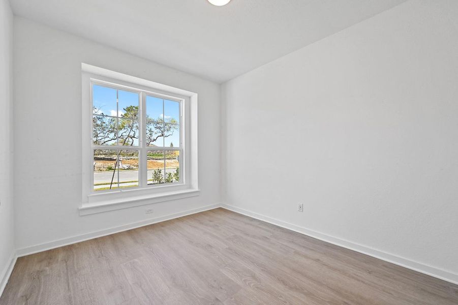 Spacious, unfurnished interior of a new home in 6 Creeks at Waterridge, Kyle (Image 12).