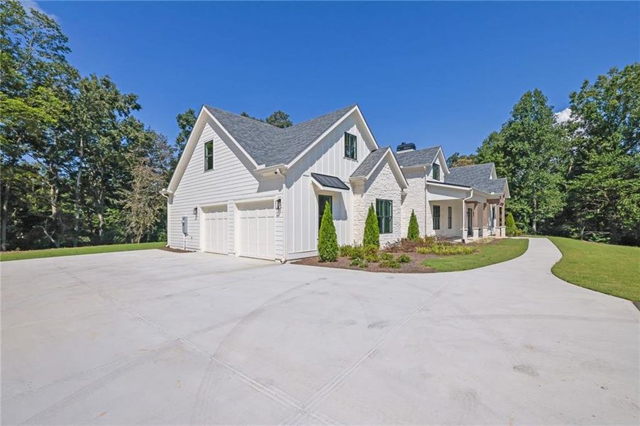Front exterior of a new home in , Ellijay, GA, highlighting curb appeal (Image 26).