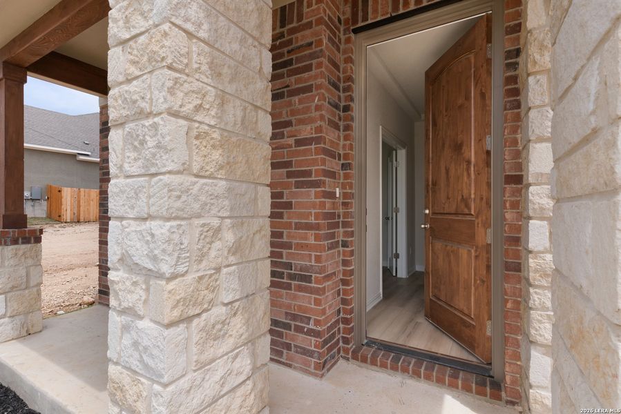 Exterior details and patio area of a home in Meyer Ranch - Enclave, New Braunfels (Image 13).