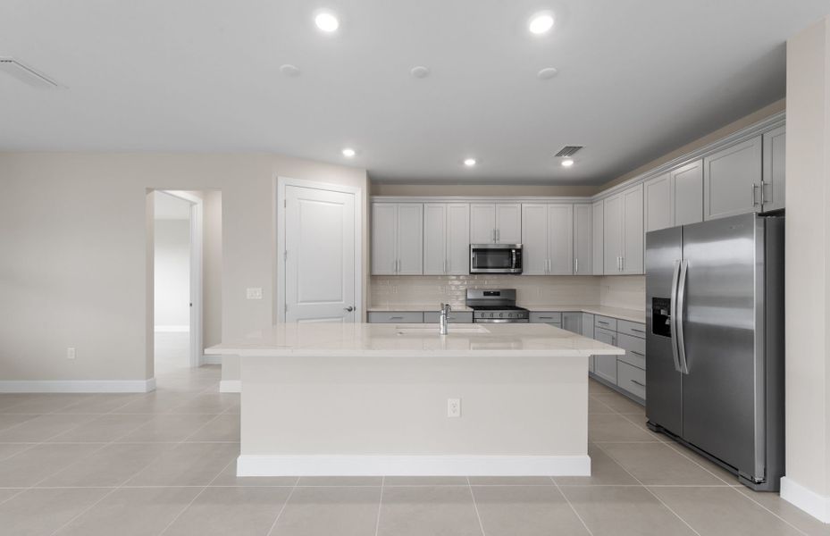 Furnished interior view inside a new home in Del Webb Oak Creek, North Fort Myers (Image 9).