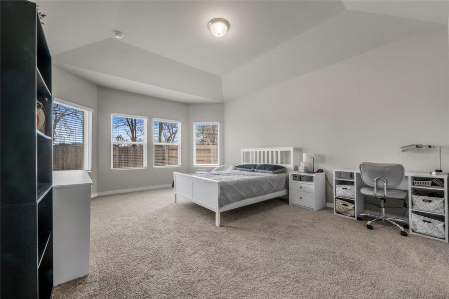 Relaxing primary bedroom retreat offering privacy and comfort, with enough space for a full bedroom set and a calm atmosphere perfect for unwinding after a long day.