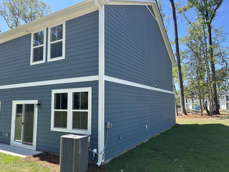 Exterior details and patio area of a home in , Summerville (Image 21).