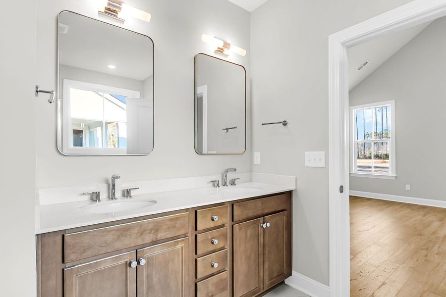 Furnished interior view inside a new home in Tidewater at Lakes of Cane Bay, Summerville (Image 12).