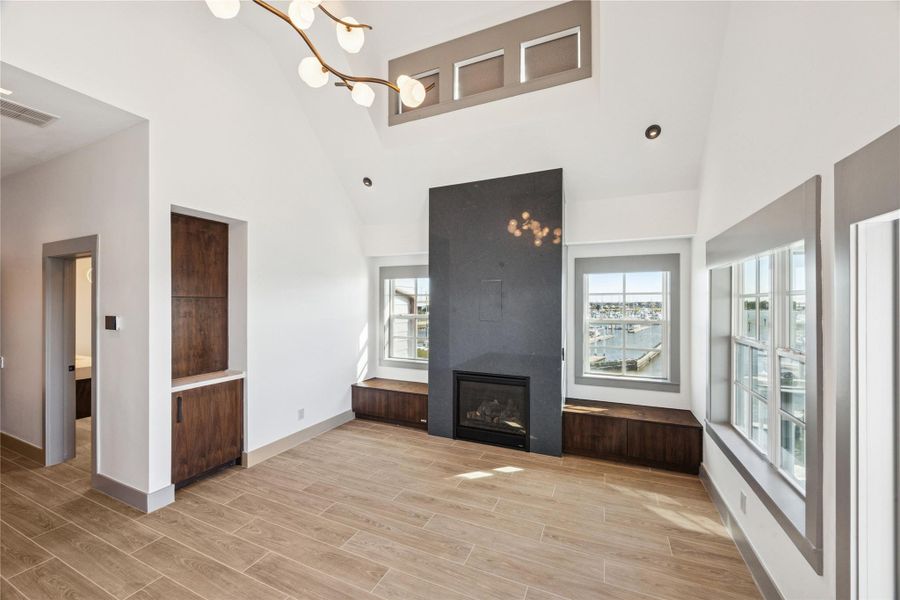 Primary suite with expansive views and automatic blinds that reveal them.