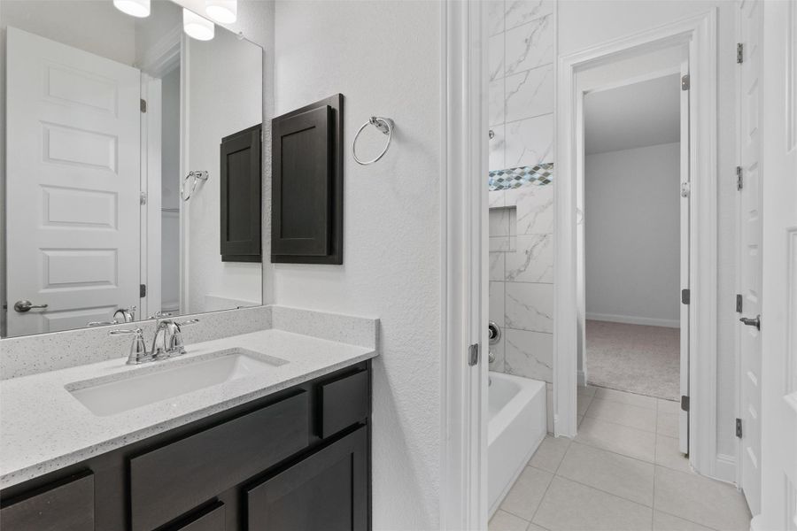 Furnished interior view inside a new home in Spicewood Trails, Spicewood (Image 17). Furnished interior view inside a new home in Spicewood Trails, Spicewood (Image 17).