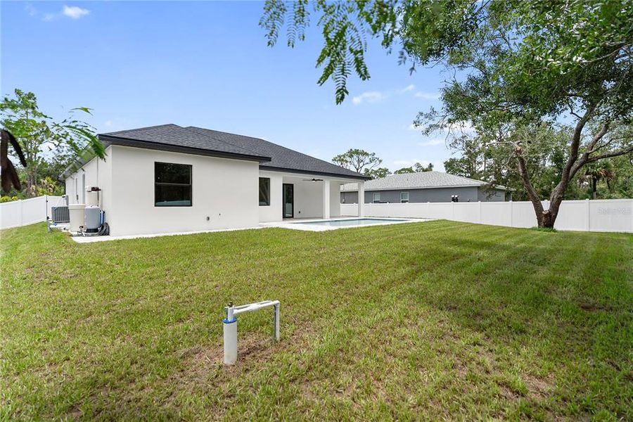 Exterior details and patio area of a home in , Port Charlotte (Image 32).