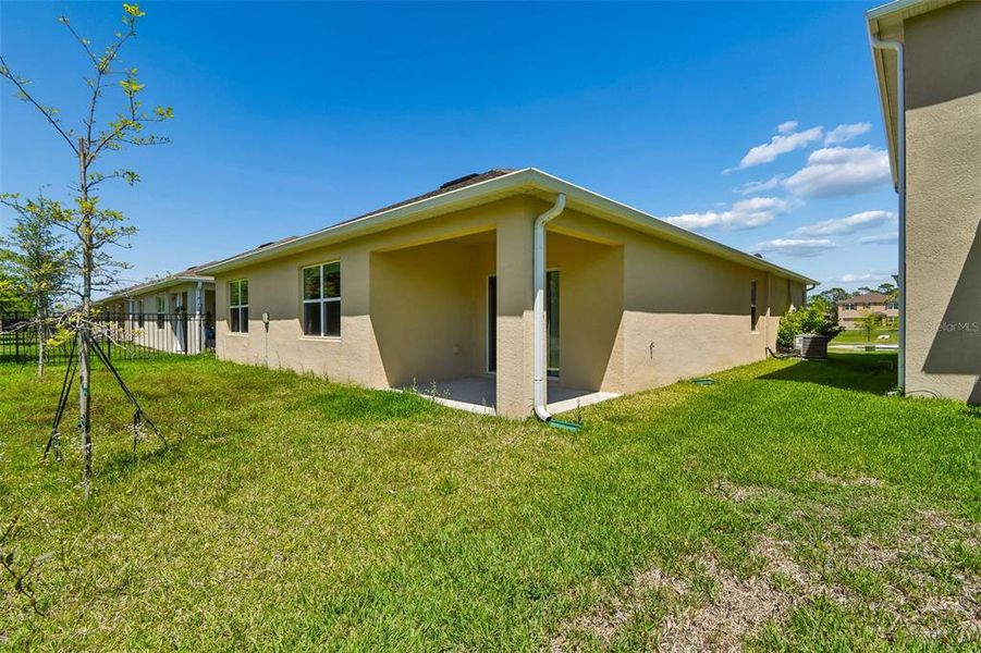 Exterior details and patio area of a home in Riviera Bella, Debary (Image 30).