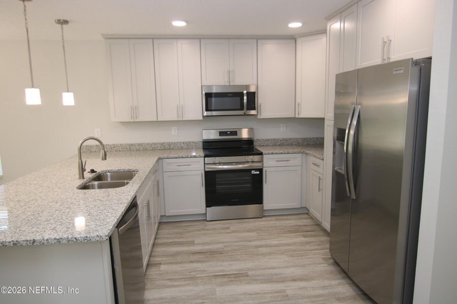 Furnished interior view inside a new home in , Jacksonville (Image 6).